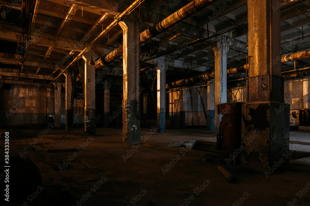 Dark creepy empty abandoned industrial building interior at night Dark creepy empty abandoned industrial building interior at night