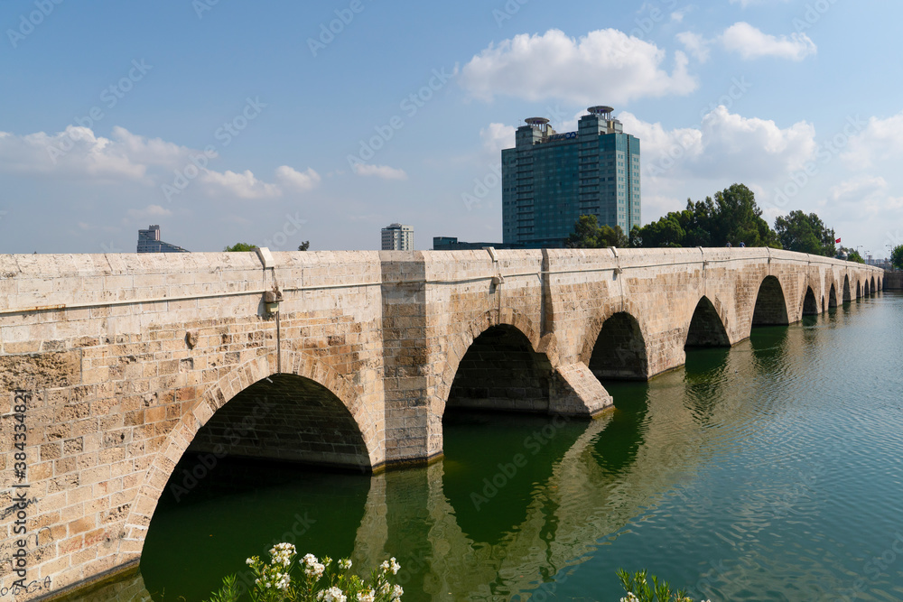Adana/Turkey- September 13 2020: The Stone Bridge on Seyhan River