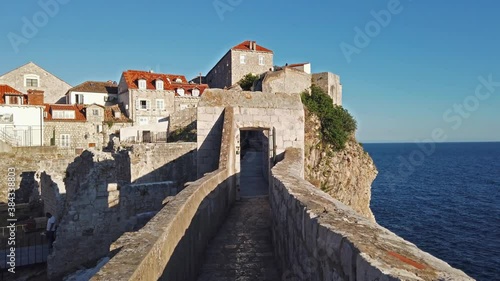 Walk on the ancient, defensive city wall in Dubrovnik, Croatia at the Dalmatian Coast of the Adriatic Sea.