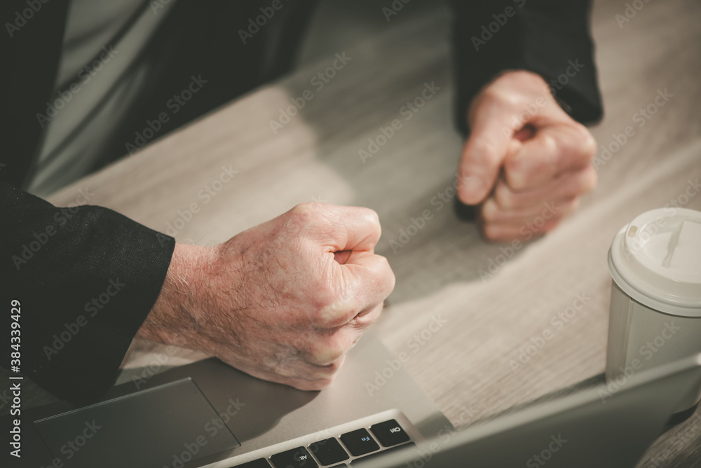 Angry businessman at his workplace Angry businessman at his workplace