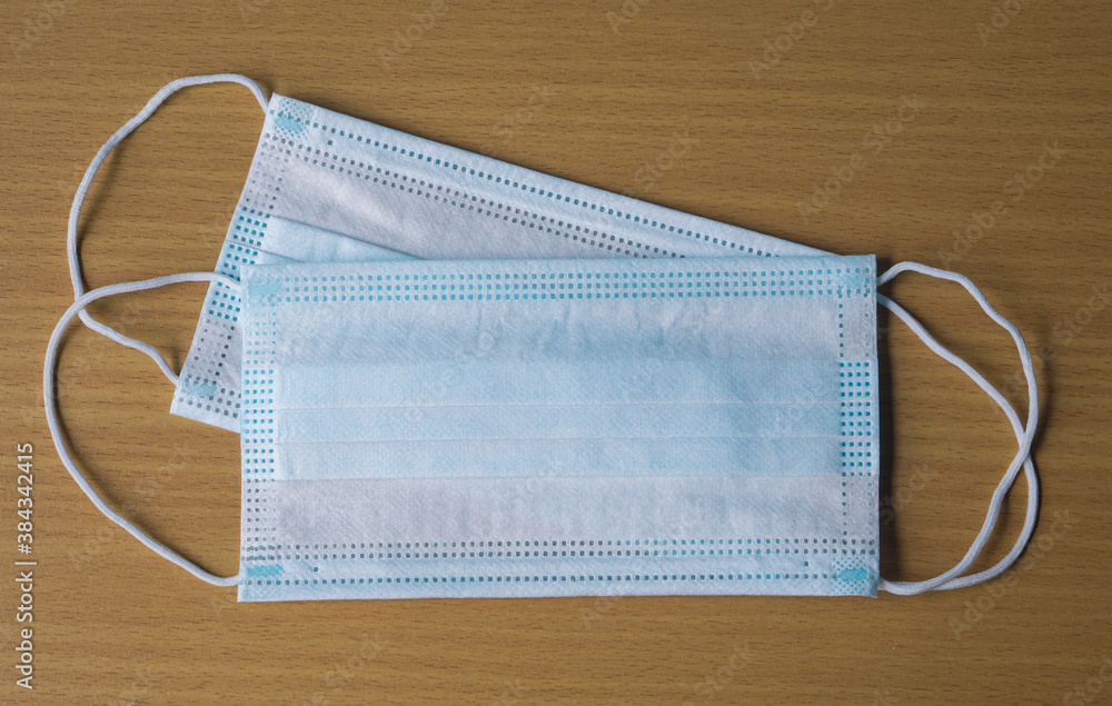 Mask prevent coronavirus. Hygiene on wood background. Covid-19 concept. Mask prevent coronavirus. Hygiene on wood background. Covid-19 concept.