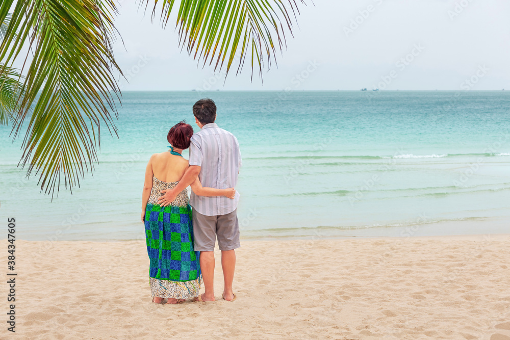 Middle aged couple relaxing at chaweng beach in koh samui ,Thailand. Middle aged couple relaxing at chaweng beach in koh samui ,Thailand.