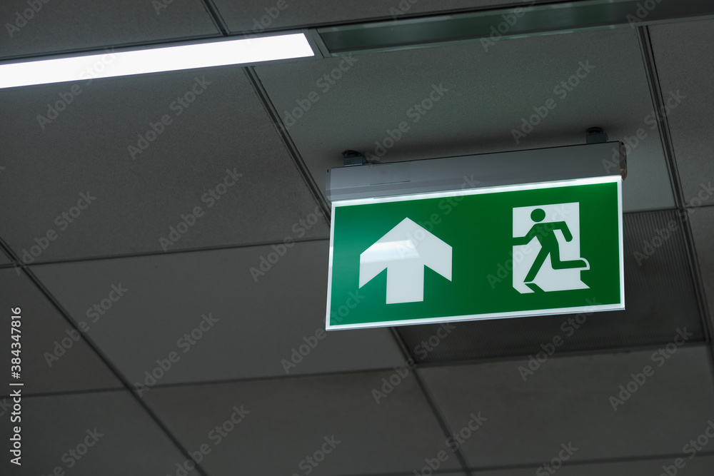 Emergency exit sign in the building Emergency exit sign in the building