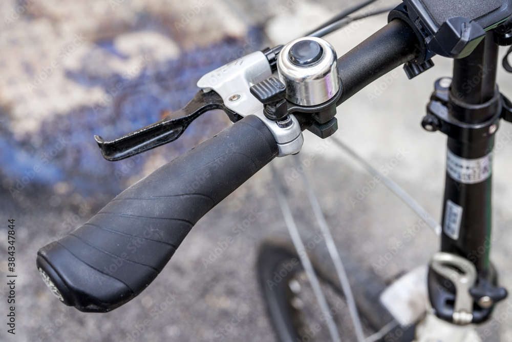 Close-up of the handlebar of the bicycle front Close-up of the handlebar of the bicycle front