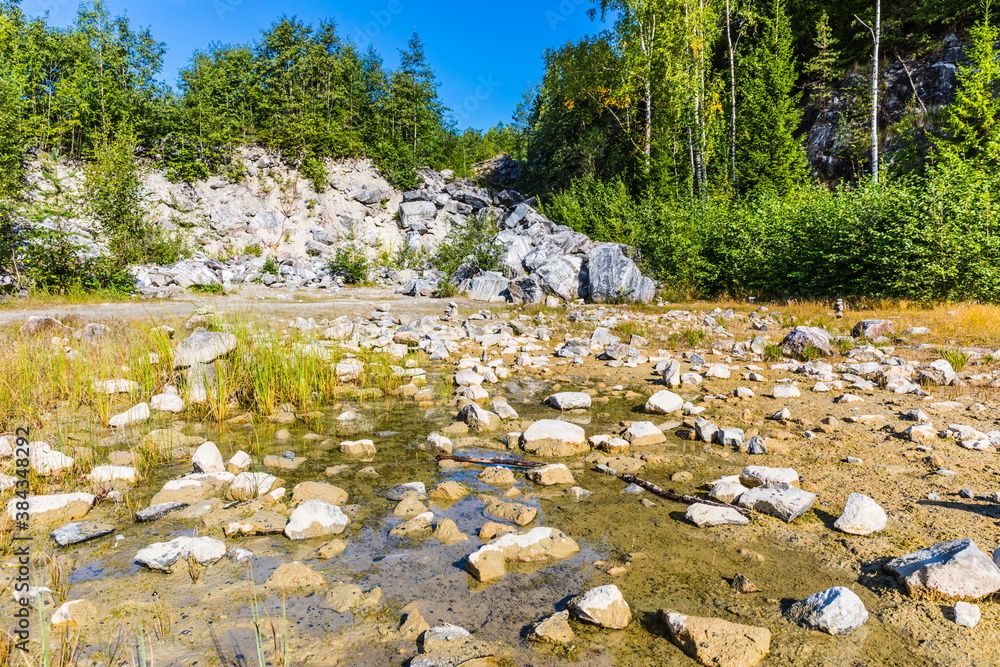 Rocky slope in The Ruskeala Mountain Park in Karelia, Russia Rocky slope in The Ruskeala Mountain Park in Karelia, Russia