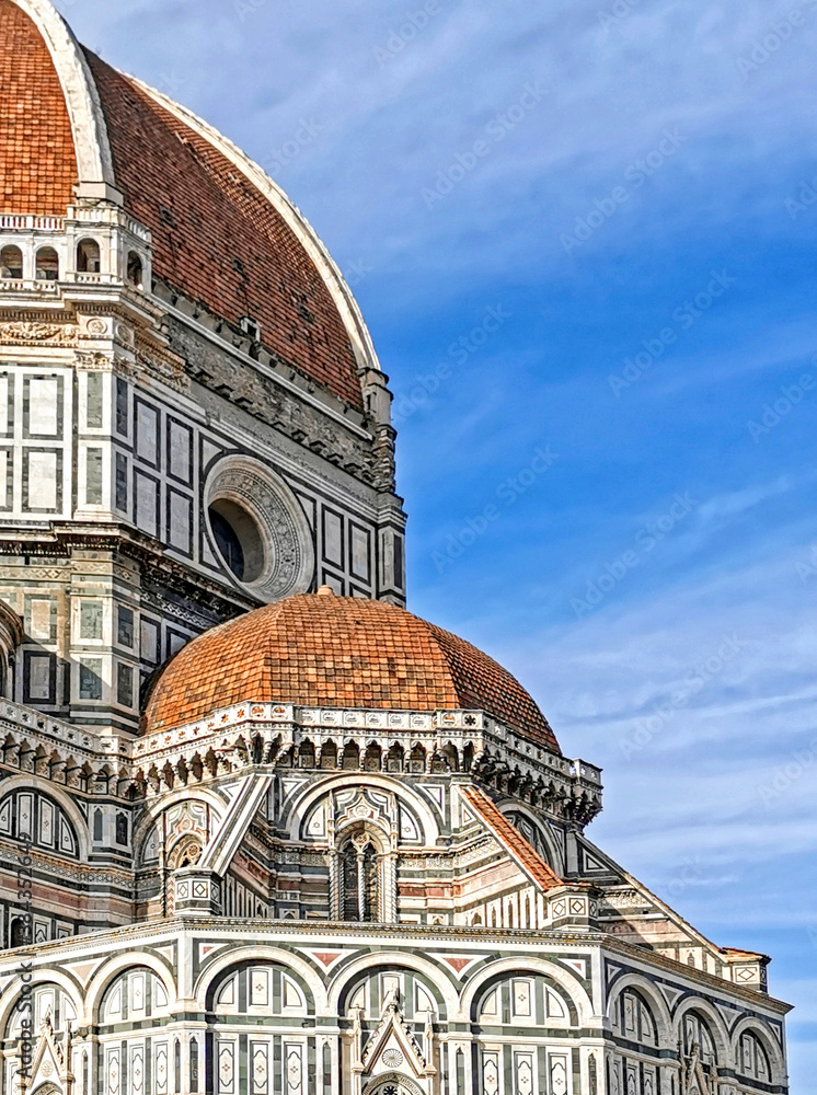 The marble apse of Florence Cathedral (Santa Maria del Fiore) with the red-brick dome designed by Brunelleschi, Florence, Tuscany, Italy.