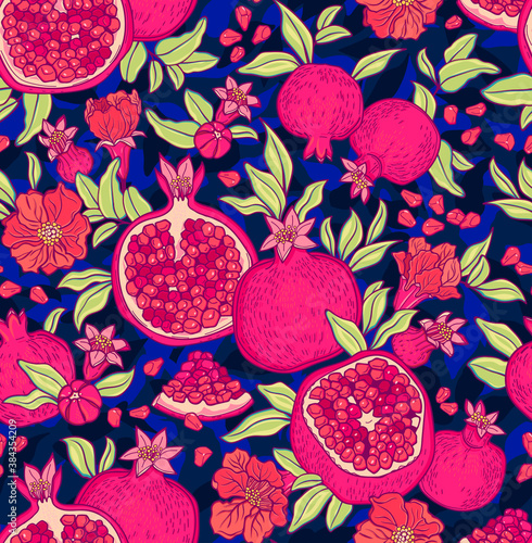 Seamless pattern with pomegranates. Decorative patterns of the pomegranate fruit on dark blue background . Fruits background. Texture with floral elements. The elegant the template for fashion prints.
