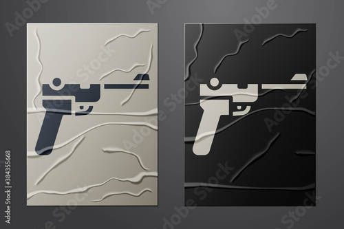 White Mauser gun icon isolated on crumpled paper background. Mauser C96 is a semi-automatic pistol. Paper art style. Vector.