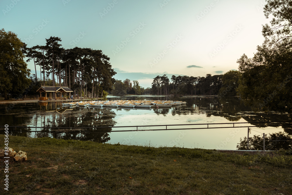 Inferior lake and barks in Bois de Boulogne, near Paris