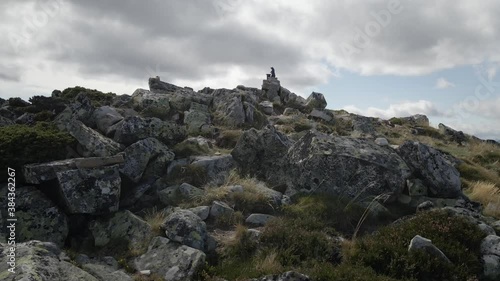 Aerial Mountain Summit with a Bear on the Top indicating the End. Healthy Mountaineering Lifestyle in a Rocky Environment. Asturias, Spain.