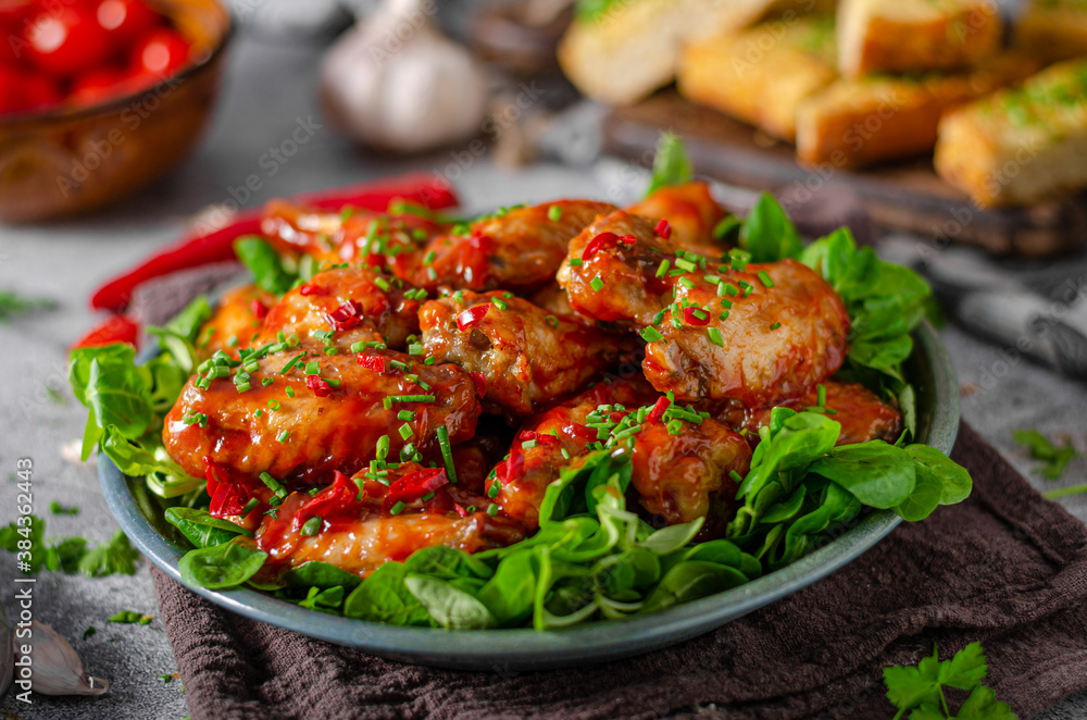 Delicious hot wings with chilli and garlic Delicious hot wings with chilli and garlic