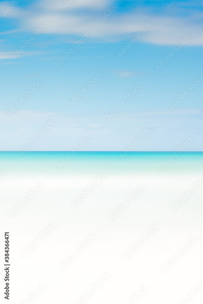 Blur tropical beach with bokeh sun light wave abstract background. Copy space of outdoor summer vacation and travel adventure concept. Blur tropical beach with bokeh sun light wave abstract background. Copy space of outdoor summer vacation and travel adventure concept.