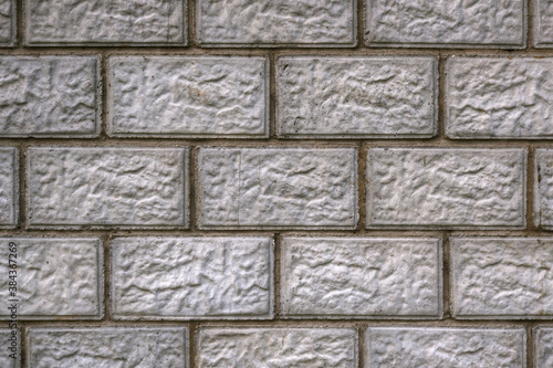 Wallpaper Mural The wall of the house is made of gray concrete blocks. Aged background or wallpaper. The seams form a pattern similar to brickwork. Dramatic backdrop on the theme of home construction and renovation Torontodigital.ca