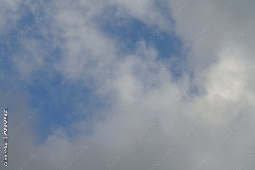 Clouds with some blue sky in the background Clouds with some blue sky in the background