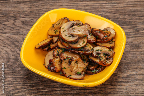 Roasted champignon with herbs and spices