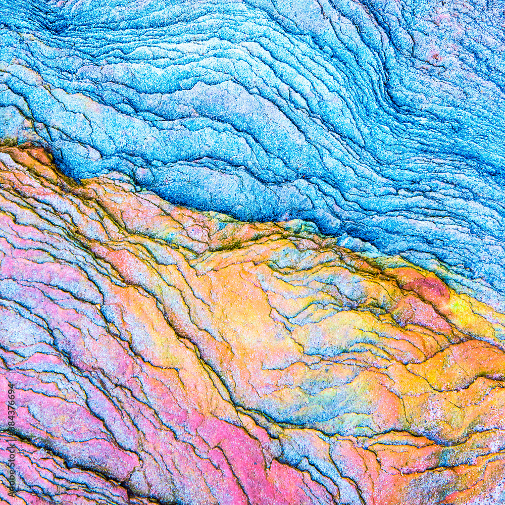 Colourful sedimentary rocks formed by the accumulation of sediments – natural rock layers backgrounds, patterns and textures - abstract graphic design – geology – nature formations