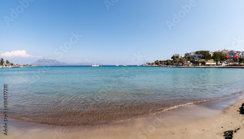 Fototapeta Naklejka Na Ścianę i Meble -  Beautiful seascape with clear blue water of Aegean sea. View from Kumluk beach. Datca town, province of Mugla, Turkey 