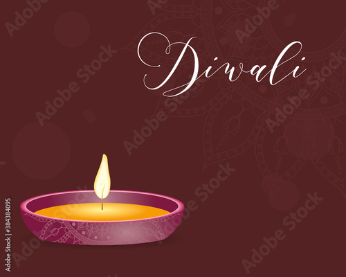 happy diwali celebration lettering with candle in brown background