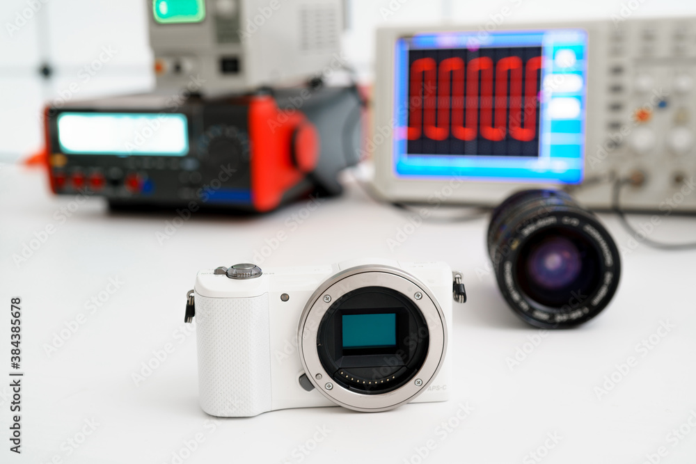 Fototapeta premium Repair of a mirrorless camera in a service center