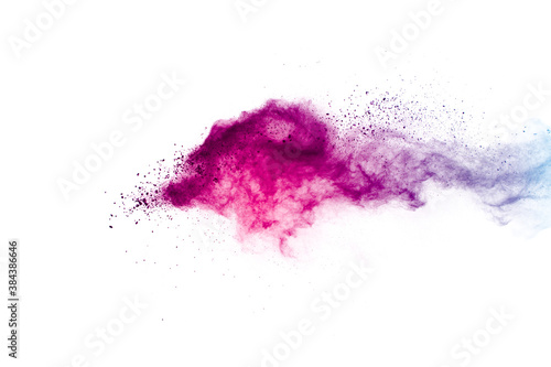Purple blue color powder explosion cloud on white background.