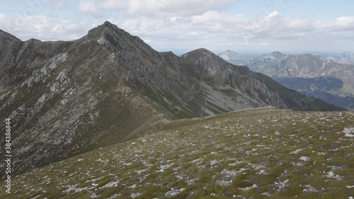 Aerial Mountaintop Ridge back after Reaching the Summit. Hikking route in a Rocky Environment. Healthy lifestyle. Asturias, Spain