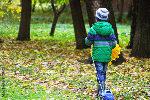 Child on a walk in autumn.