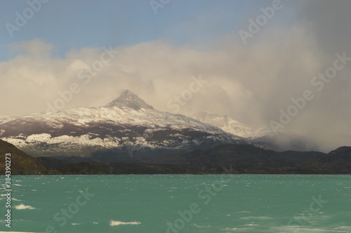 Hiking around the stunning but dramatic Torres del Paine National Park in Patagonia, Chile photo