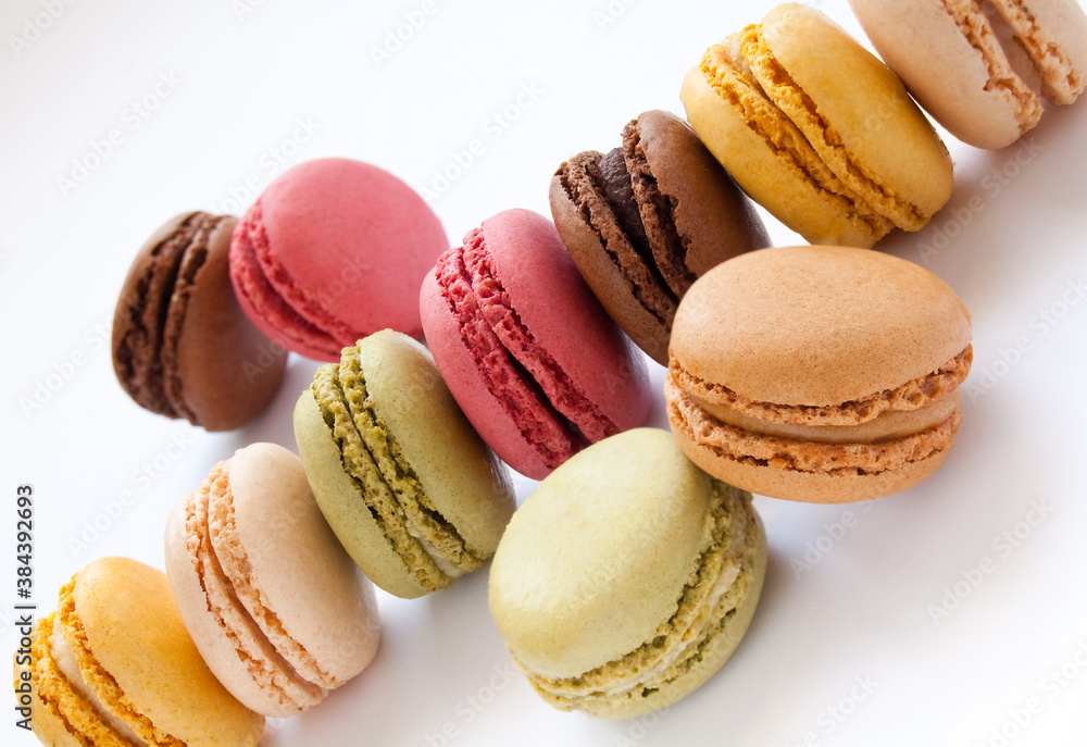 Colorful French Macarons on the white background Colorful French Macarons on the white background