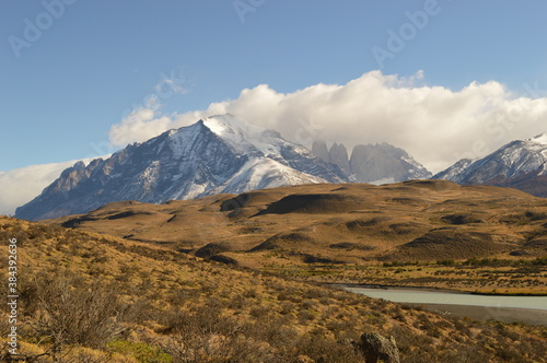 Hiking around the dramatic and windy mountain landscapes of Torres del Paine in Patagonia, Chile © ChrisOvergaard