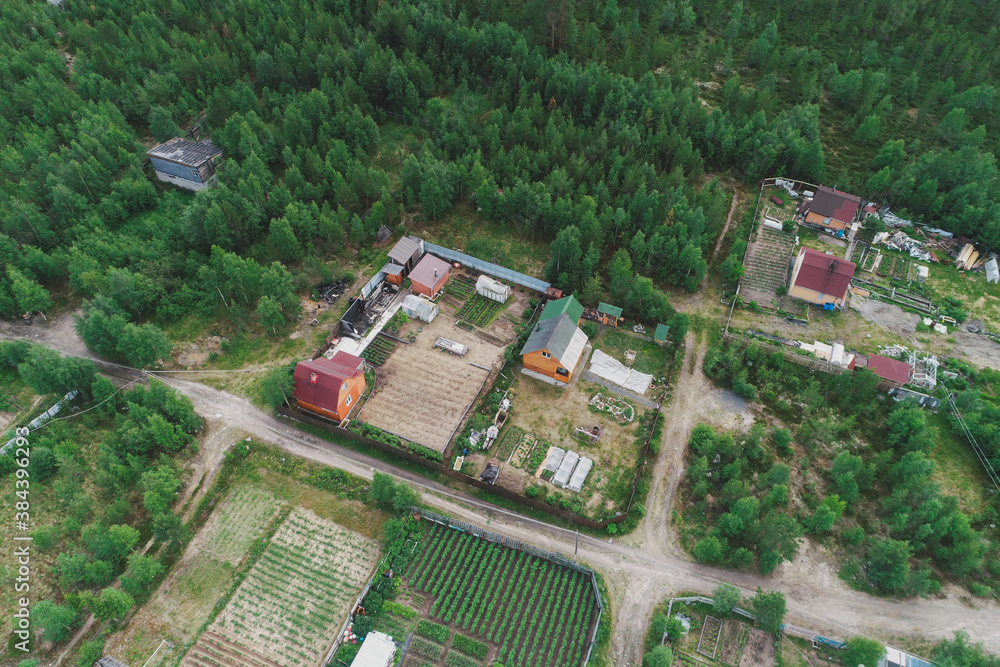 Aerial Townscape of Suburban Village Sosnoviy Bor located in Northwestern Russia on the Kola Peninsula near the town Kandalaksha Aerial Townscape of Suburban Village Sosnoviy Bor located in Northwestern Russia on the Kola Peninsula near the town Kandalaksha