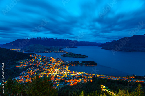 Cityscape sunset of queenstown with lake Wakatipu from the skyline south island new zealand
