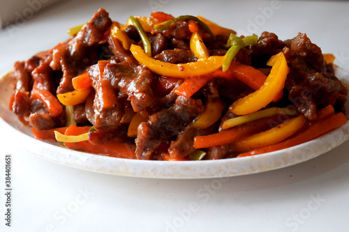 Beef and vegetables. stew with vegetables. Closeup view beef stir fry.