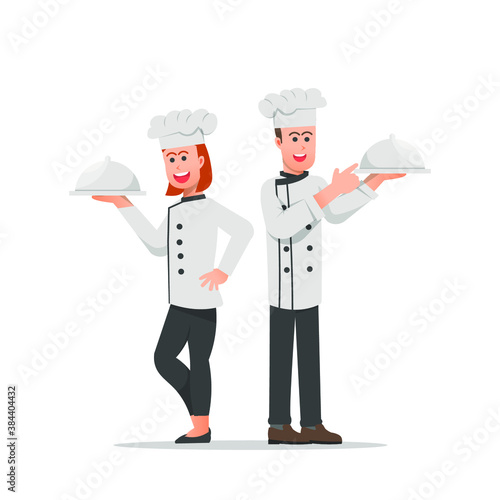 two chefs with covered dishes isolated on white