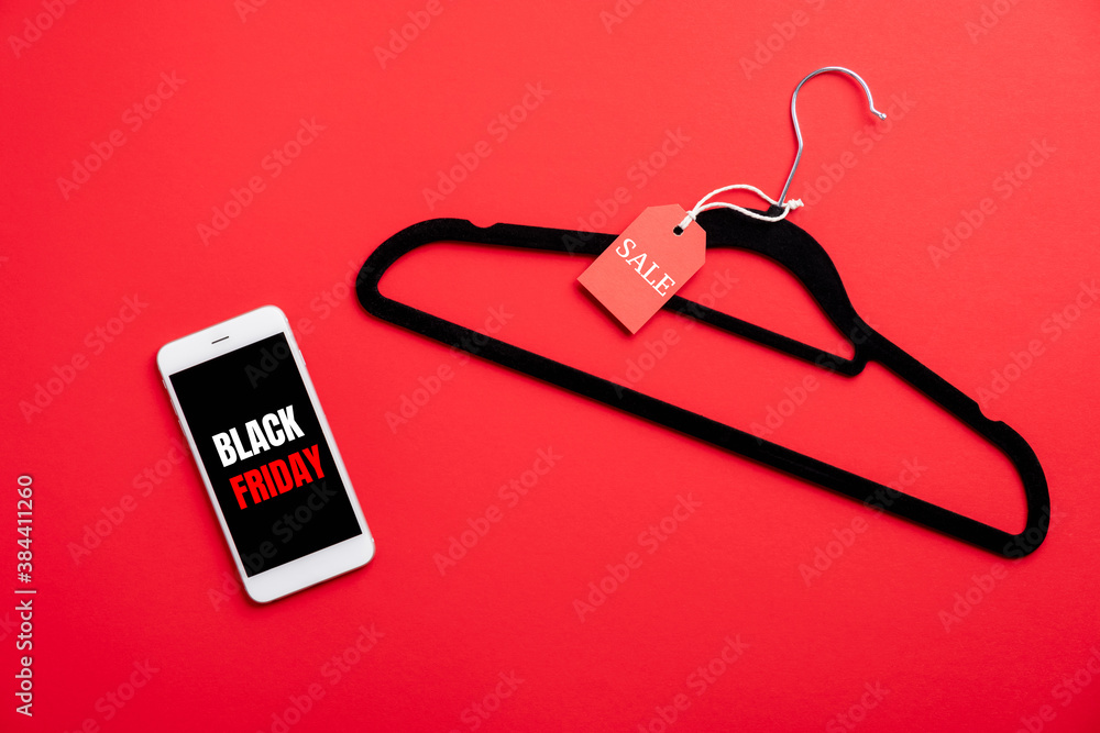 Black Friday concept. Mobile phone with sign 