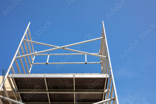 Fototapeta Renovation concept, scaffold tower