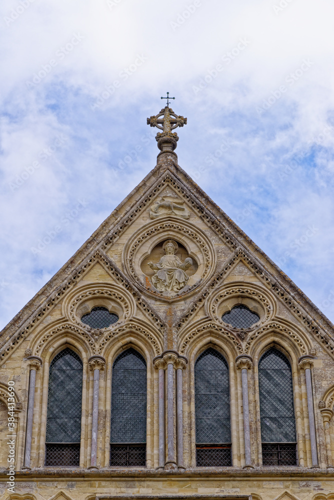 Fototapeta premium Medieval spire of Salisbury cathedral in the close Salisbury, Wiltshire, England, United Kingdom