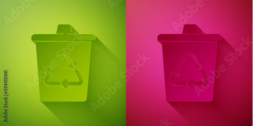 Paper cut Recycle bin with recycle symbol icon isolated on green and pink background. Trash can icon. Garbage bin sign. Recycle basket sign. Paper art style. Vector.