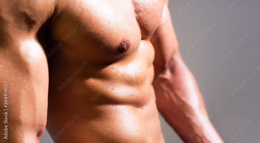 Shirtless athletic naked torso of sexy guy.