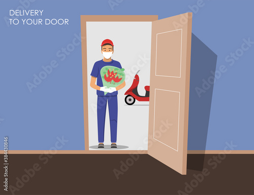 Flower bouquet delivery. Courier holding tulips. Safe, sterile flower service. Wearing mask and gloves against covid-19. Delivery motorbike in the background.