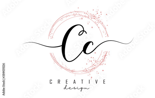 Handwritten CC C letter logo with sparkling circles with pink glitter.