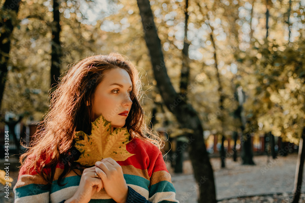 Body Shaming, Low self-worth concept. Sad plus size woman walking in autumn park Body Shaming, Low self-worth concept. Sad plus size woman walking in autumn park