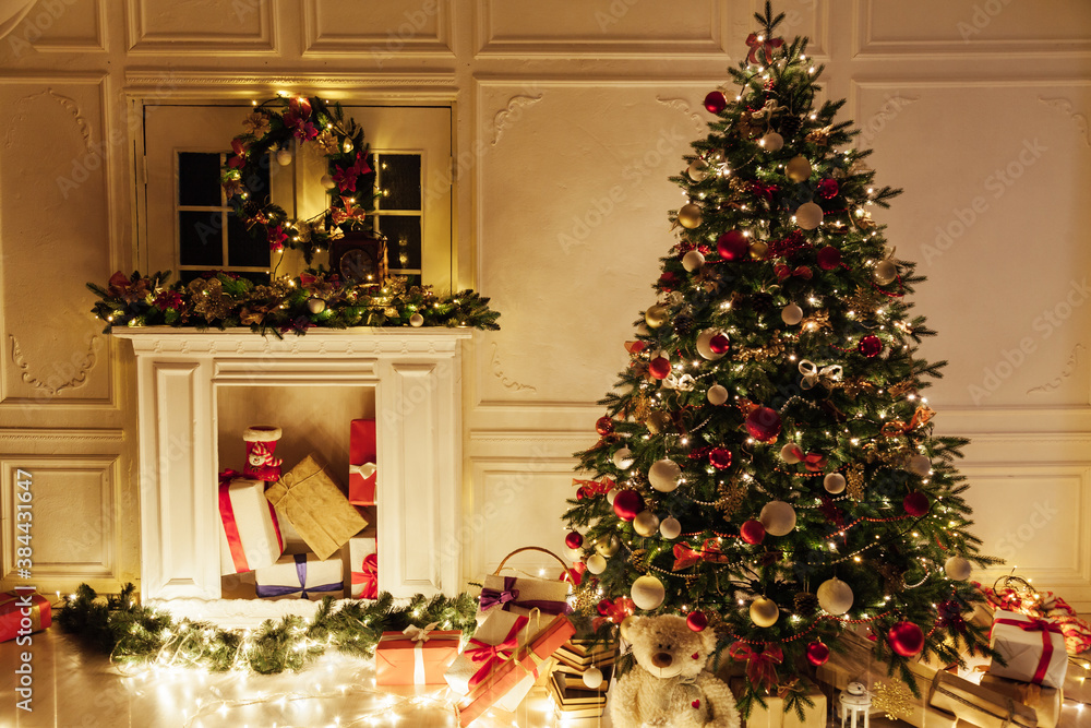 Christmas tree shines lights garlands New Year's Night warm light