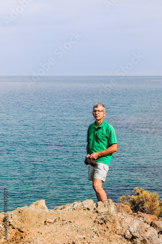 Mature man in front of Mediterranean Sea