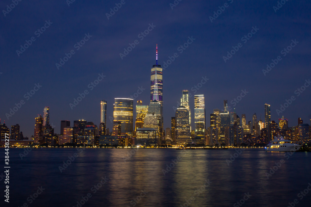 New York Skyline after sunset at night summer Manhattan NYC, world trade center, view from Jersey City New York Skyline after sunset at night summer Manhattan NYC, world trade center, view from Jersey City