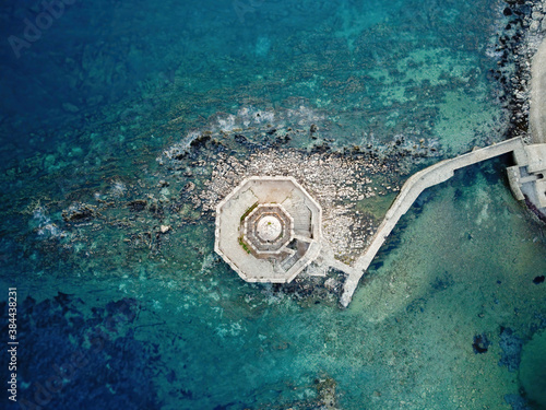 Aerial panoramic view of the Bourtzi tower in Methoni Venetian Fortress, Greece photo