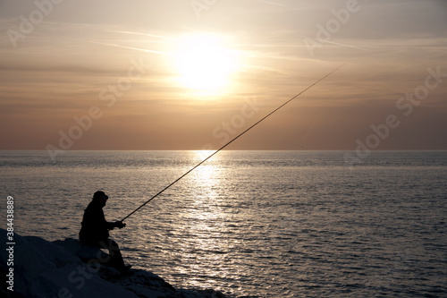 pescatore al tramontor osso © tommypiconefotografo