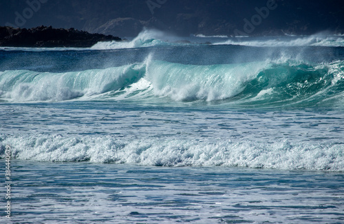 Waves breaking on the beach near the town of Carmel on the pacific coast  of California