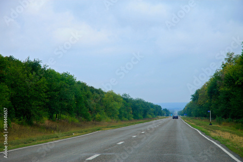 Highway landscape with moving cars at daytime