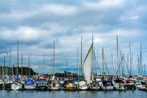 Copenhagen, Denmark - Sep 27th 2020: Sailboats docked side by side in a large marina.