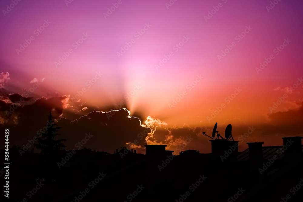 sunset cloudscape city silhouette colorful violet
